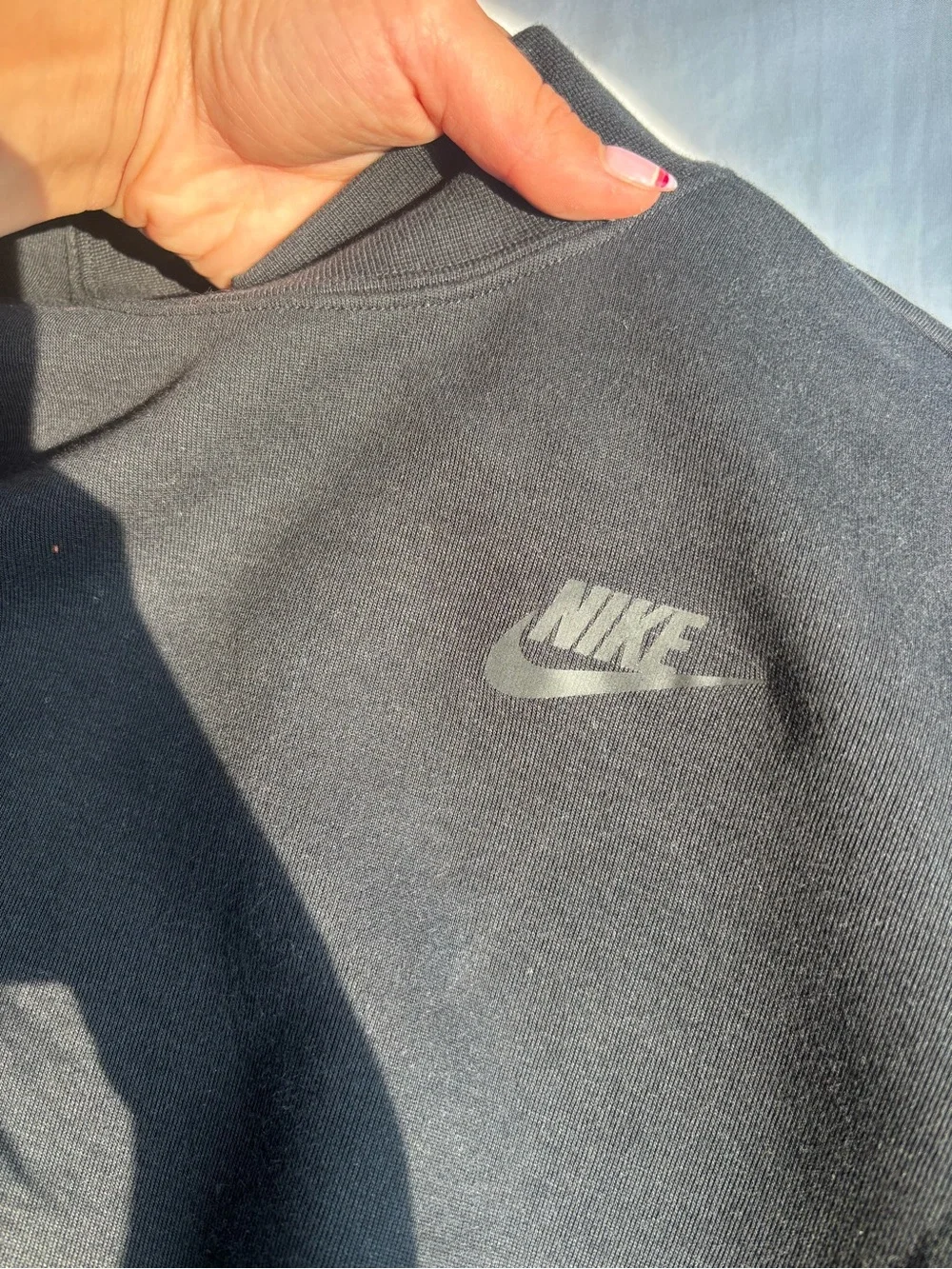 Women’s black Nike tech crewneck Sweater